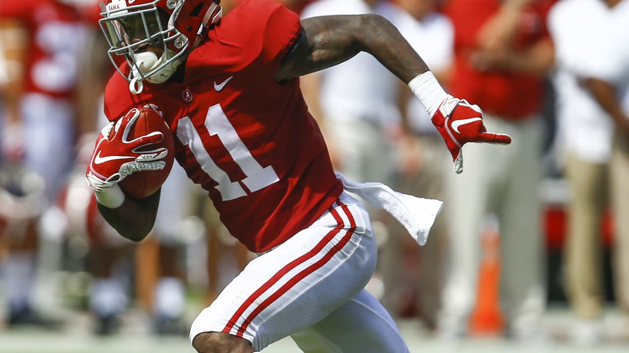 Louisiana State's Patrick Queen, left, and Oklahoma's CeeDee Lamb. (The  Associated Press)