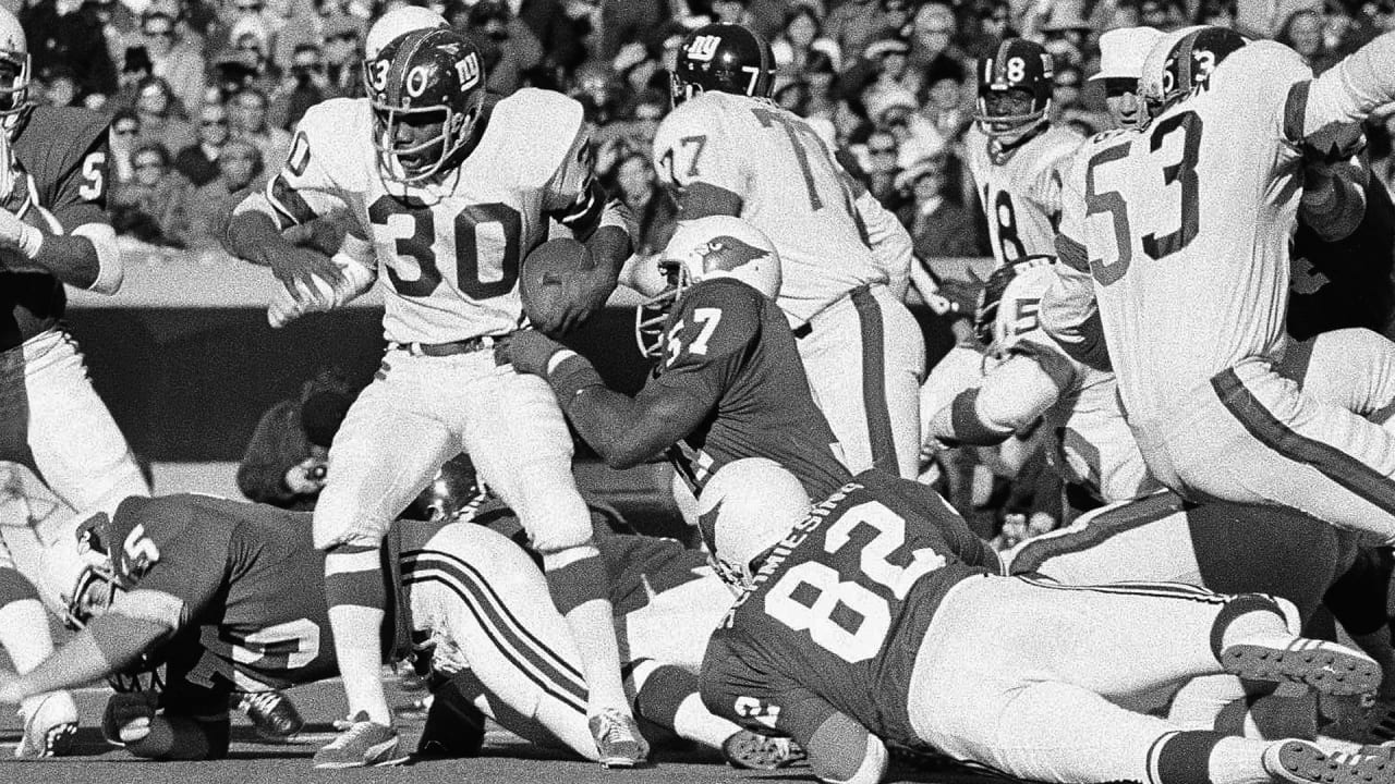 Running back Ron Johnson of the New York Giants carries the ball