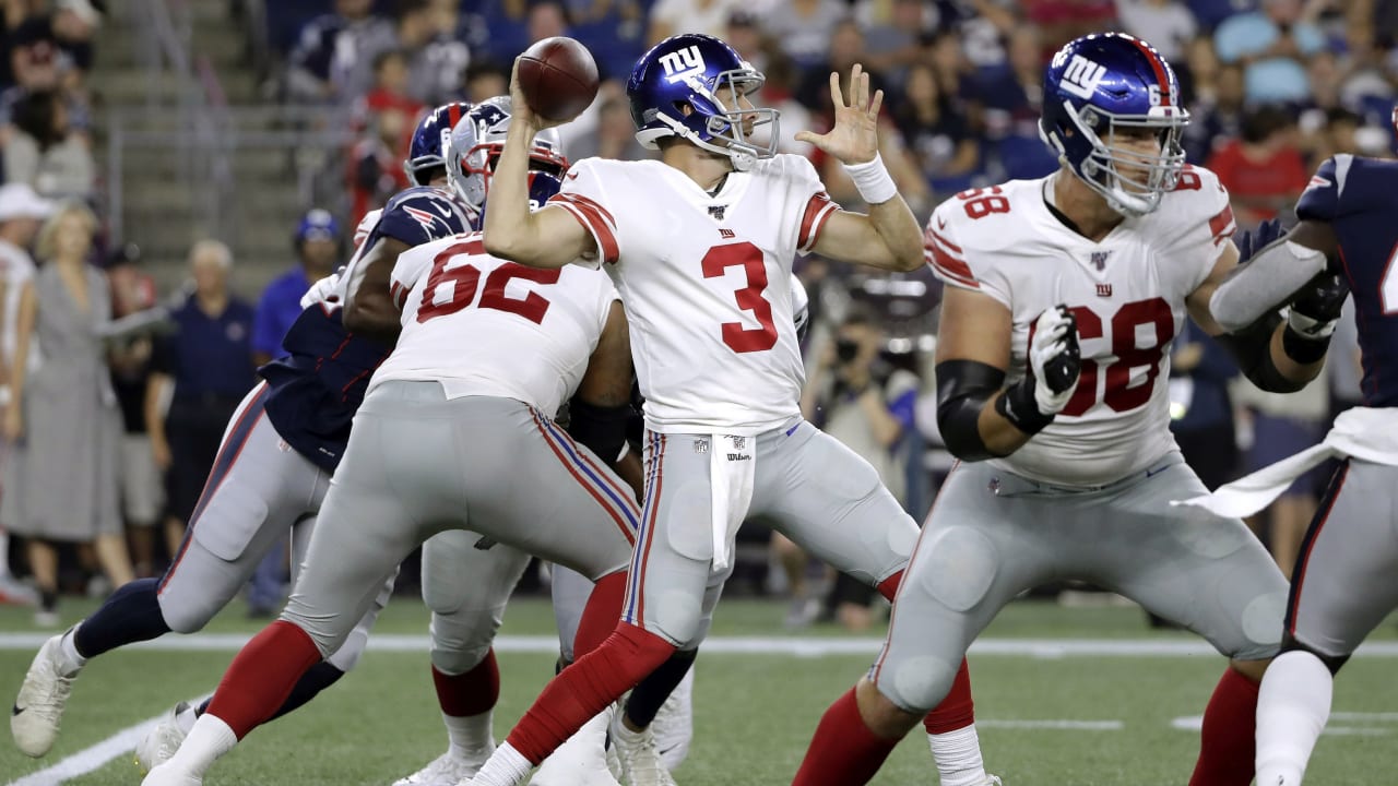 New York Giants Eli Manning fumbles the ball while being pressured by Atlanta  Falcons Jonathan Goff in week 11 of the NFL season at Giants Stadium in  East Rutherford, New Jersey on