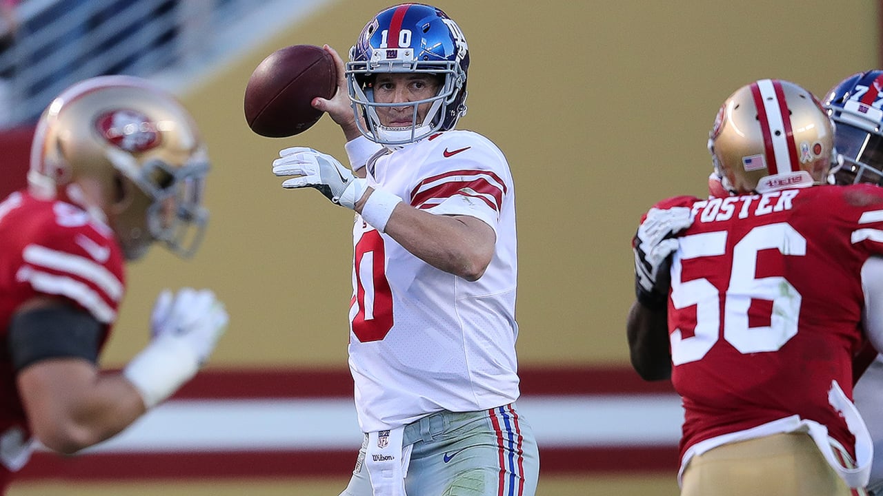 New York Giants Phil McConkey hauls in a 28-yard pass from quarterback Phil  Simms in the end zone as San Francisco 49ers Tim McKyer hangs on during  third quarter action at Giants