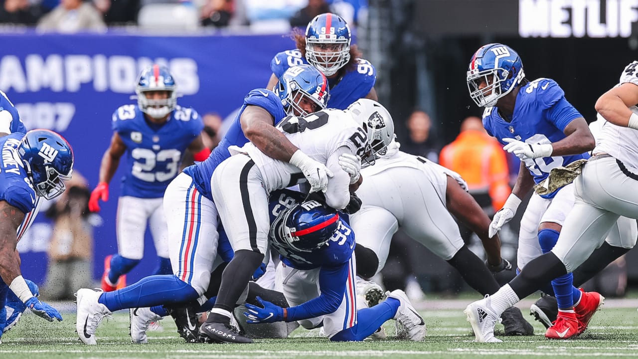 Las Vegas Raiders free safety Trevon Moehrig (25) takes down Kansas City  Chiefs running back Derrick