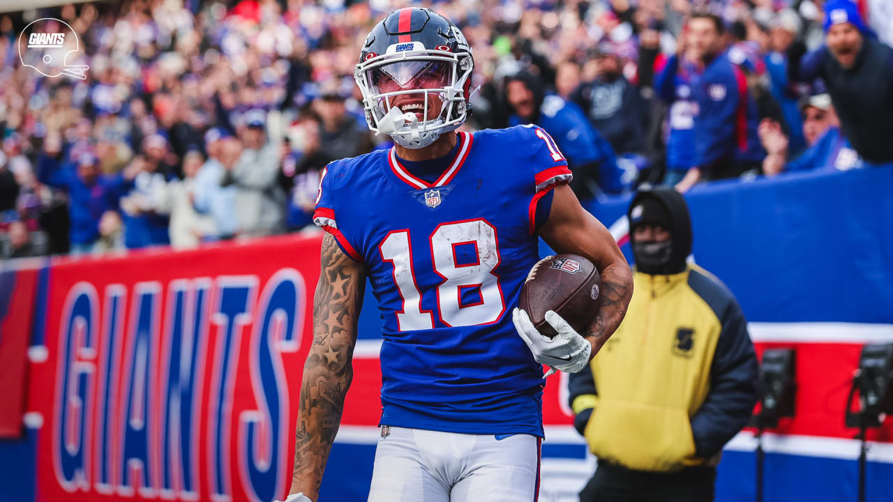 New York Giants' Isaiah Hodgins catches a pass between Minnesota