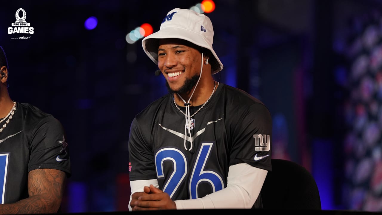 NFC captain Pete Davidson stands next to the trophy after the NFC defeated  AFC at the NFL Pro Bowl games, Sunday, Feb. 5, 2023, in Las Vegas. (AP  Photo/David Becker Stock Photo 