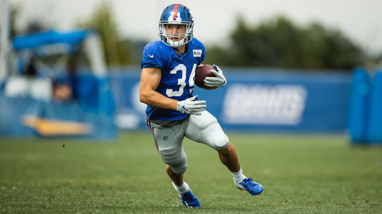 New York Giants running back Sandro Platzgummer (34) warms up before a  preseason NFL football game against the New York Jets, Saturday, Aug. 14,  2021, in East Rutherford, N.J. (AP Photo/Adam Hunger