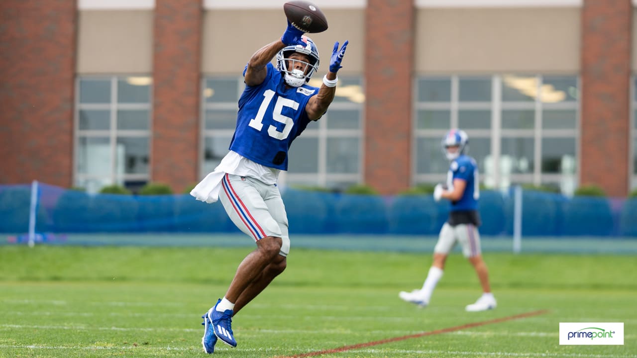 New York Giants wide receiver Collin Johnson (15) throws a shirt to fans  after the NFL football team's practice in East Rutherford, N.J., Friday,  Aug. 5, 2022. (AP Photo/Adam Hunger Stock Photo - Alamy