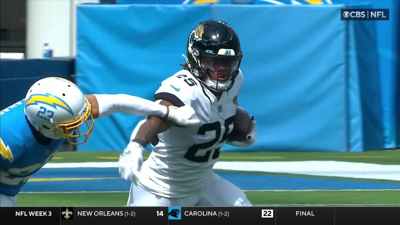 Jacksonville Jaguars running back James Robinson (25) runs the ball for a  touchdown during the first half of an NFL football game against the  Indianapolis Colts, Sunday, Sept. 18, 2022, in Jacksonville