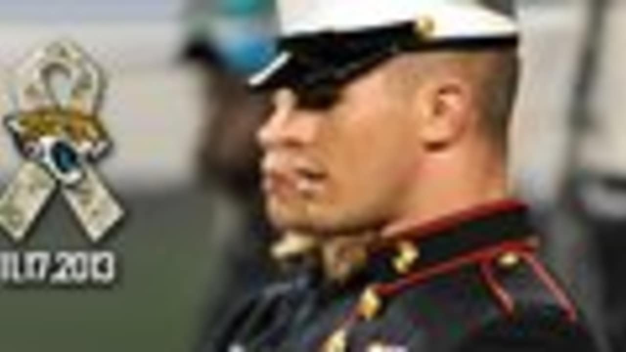 U.S. Military recruits are sworn in during halftime on Salute to