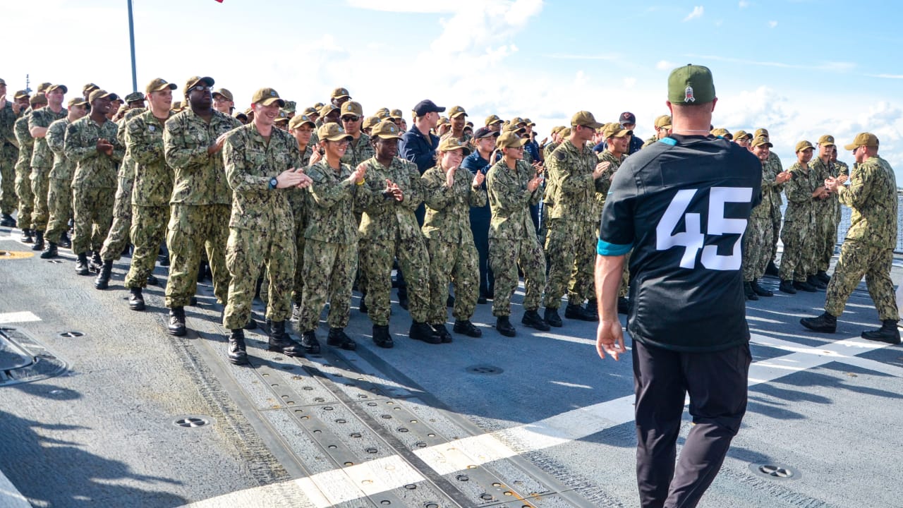 U.S. Marines stand at parade rest during the Jacksonville Jaguars