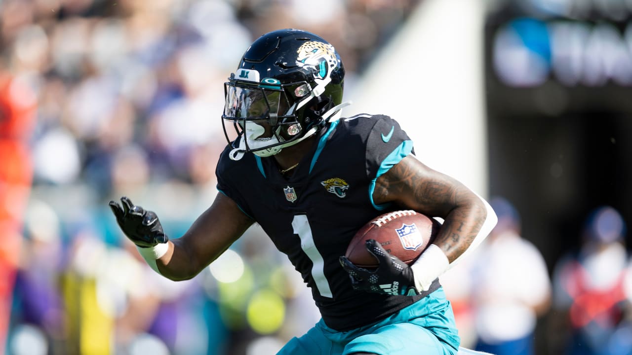 Travis Etienne Jr. #1 of the Jacksonville Jaguars smiles on the News  Photo - Getty Images