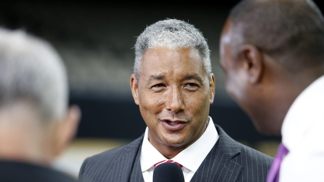 NFL Network reporter Steve Wyche works from the sideline before an