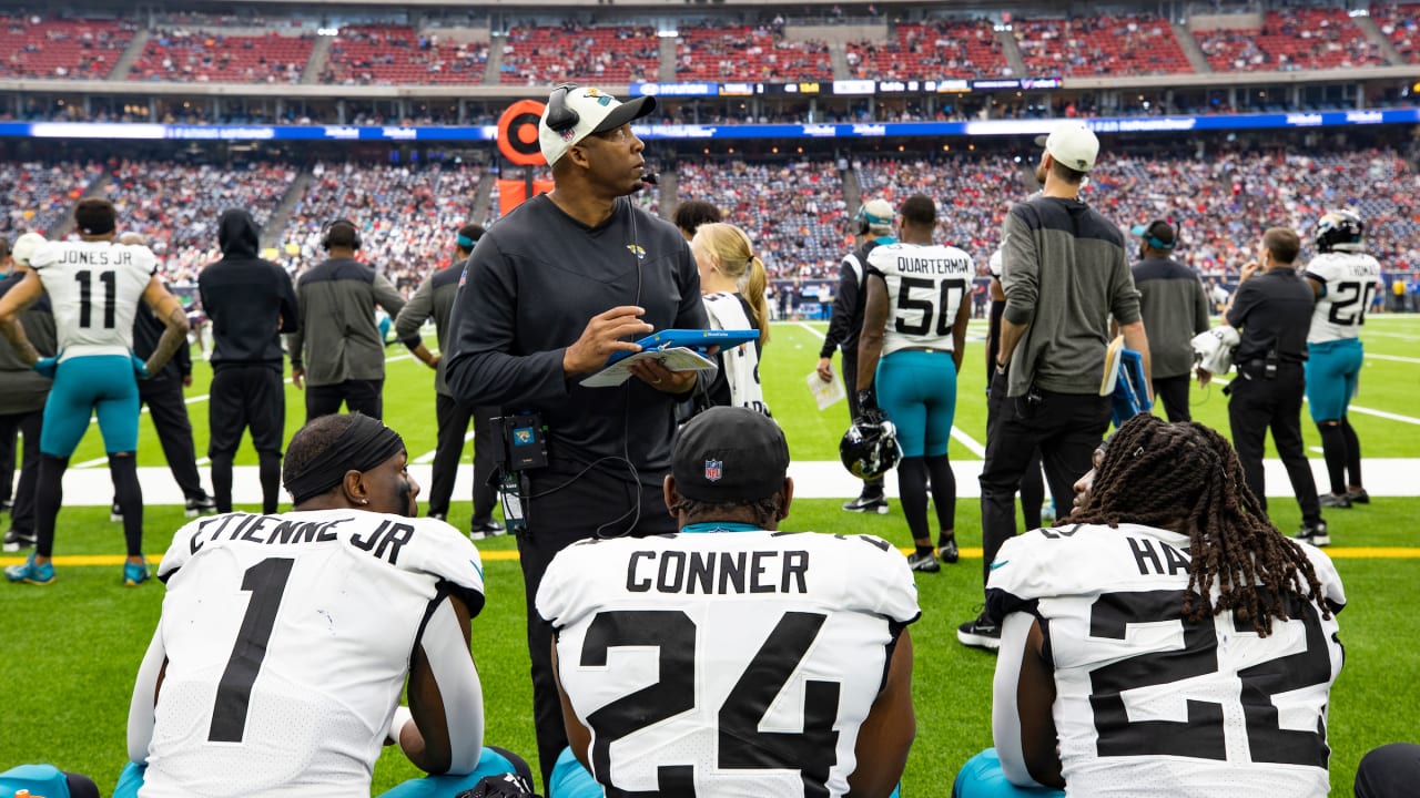 Jacksonville Jaguars running back Travis Etienne Jr., left, and Houston  Texans running back Dare Ogunbowale, right, exchange jerseys after an NFL  football game in Jacksonville, Fla., Sunday, Oct. 9, 2022. (AP Photo/Phelan