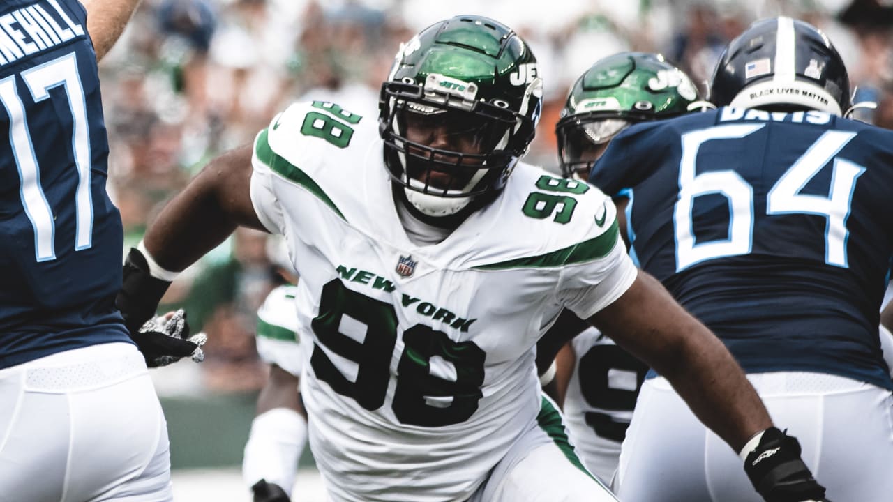 New York Jets defensive tackle Sheldon Rankins tackles Denver