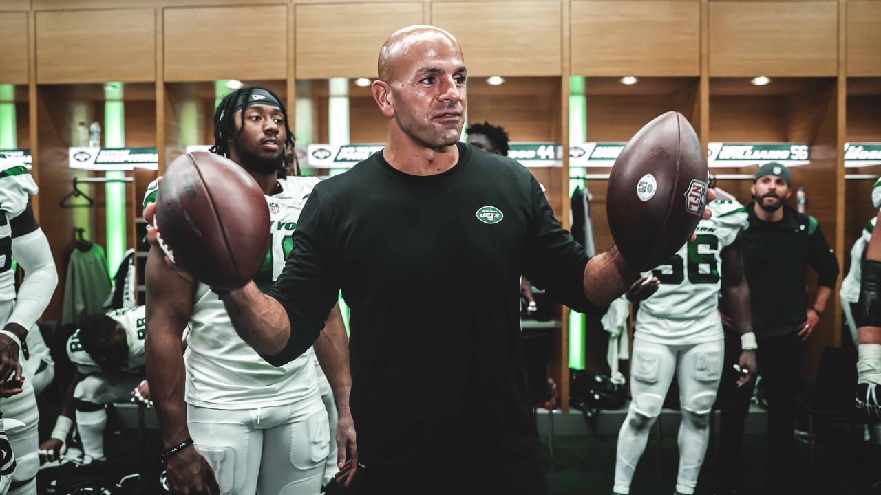 New York Jets Players in Locker Room Around Pool Table. 