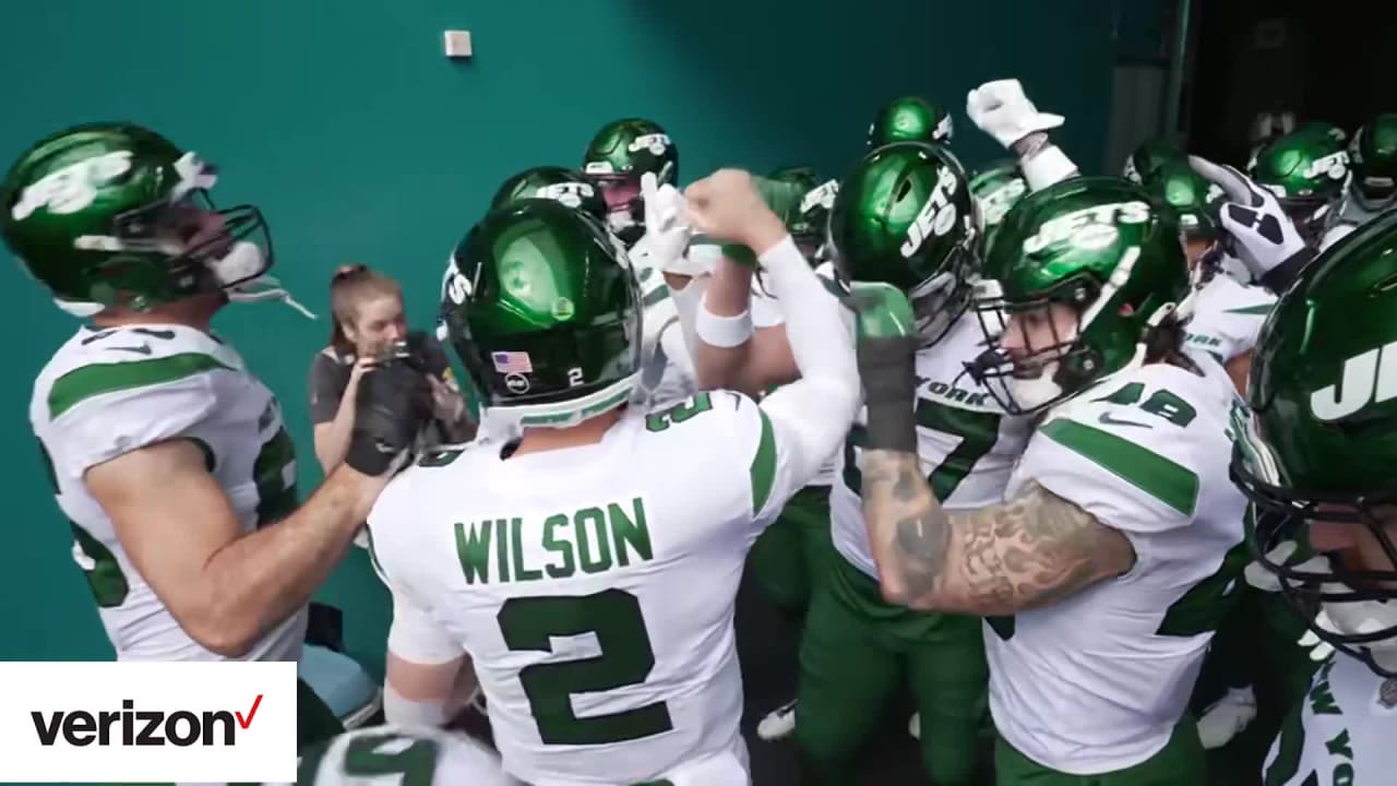 Zach Wilson steps into the huddle again for the Jets with Aaron