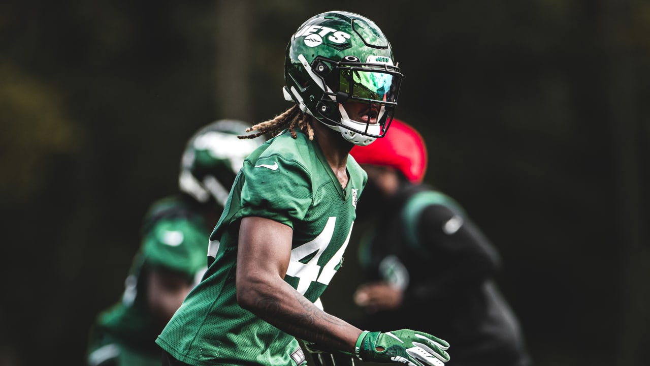 What is the green dot on the back of quarterback's helmet in the