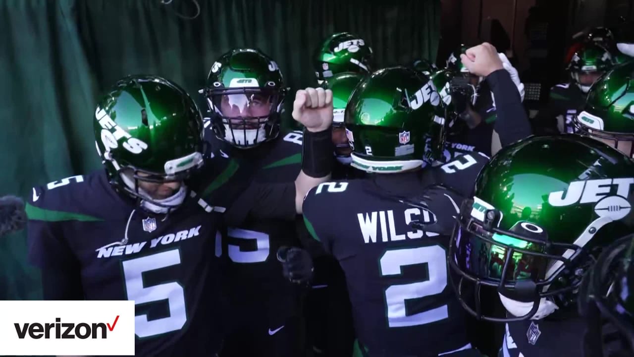 Zach Wilson steps into the huddle again for the Jets with Aaron