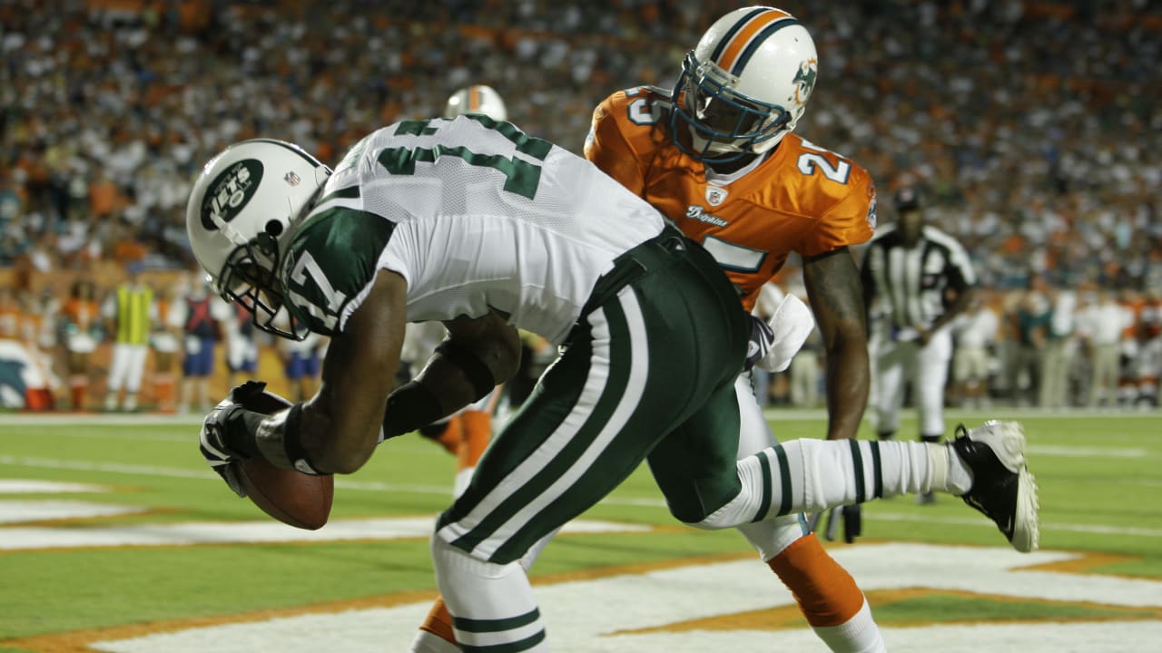 Miami Dolphins line backer Jason Taylor has some words for a referee during  the first quarter against the New York Jets of an NFL football game,  Monday, October 12, 2009, at Land