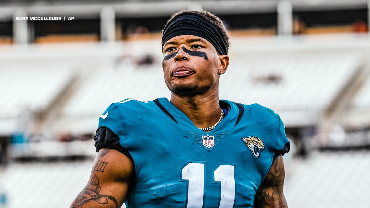 Jacksonville Jaguars wide receiver Marvin Jones Jr. (11) runs onto the  field for an NFL wild-card football game against the Los Angeles Chargers,  Saturday, Jan. 14, 2023, in Jacksonville, Fla. (AP Photo/Gary