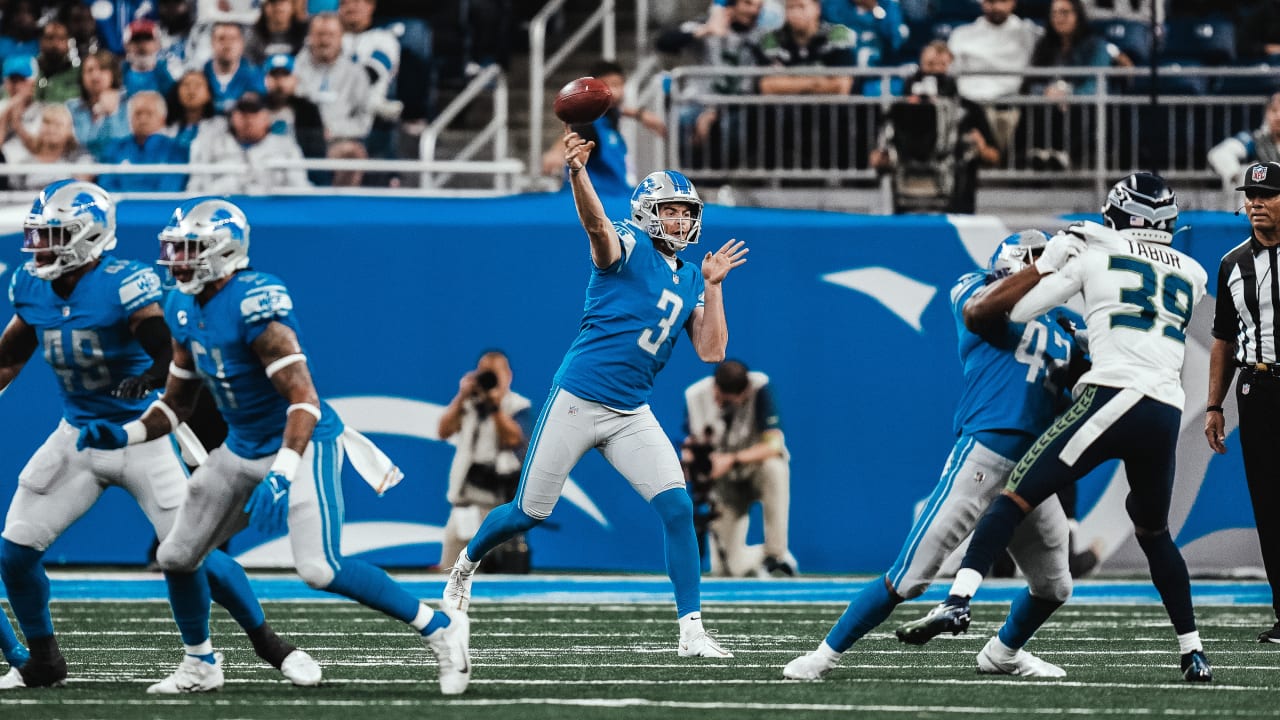 Detroit Lions punter Jack Fox (3) punts against the Seattle