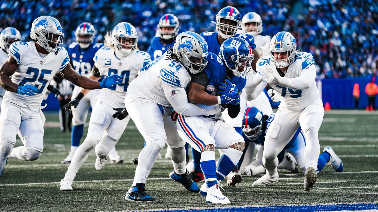 Detroit Lions defensive tackle Alim McNeill sits in the bench area