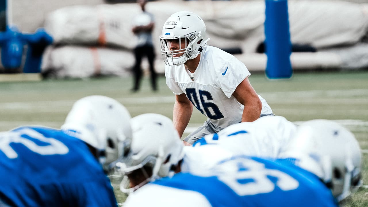 Detroit Lions linebacker Trevor Nowaske runs a drill during an NFL