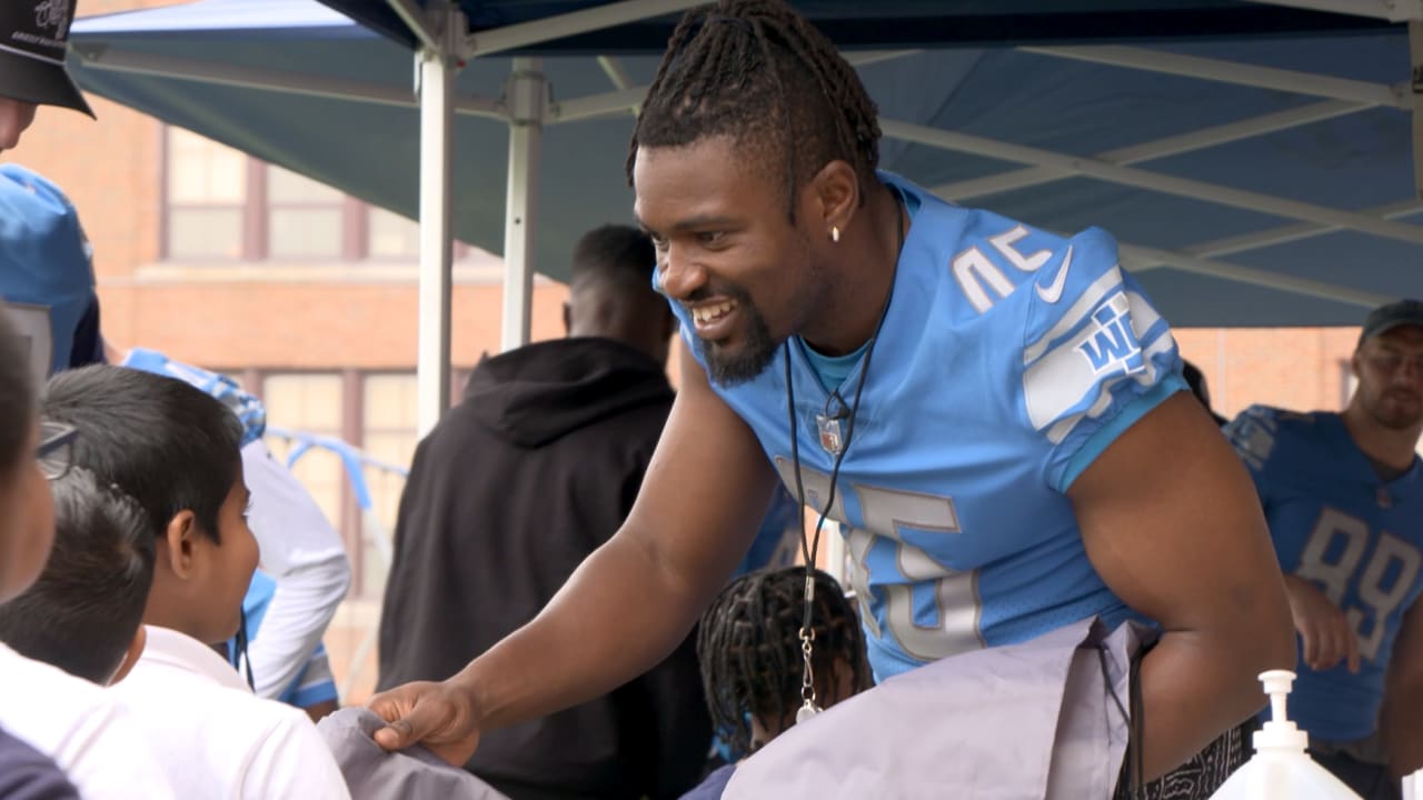 Detroit Lions fullback Jason Cabinda gives back