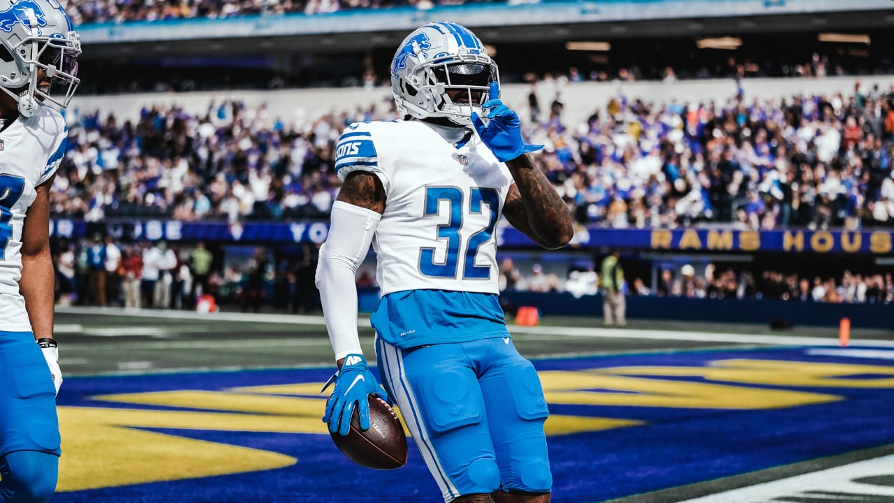 Detroit Lions running back D'Andre Swift celebrates his touchdown run