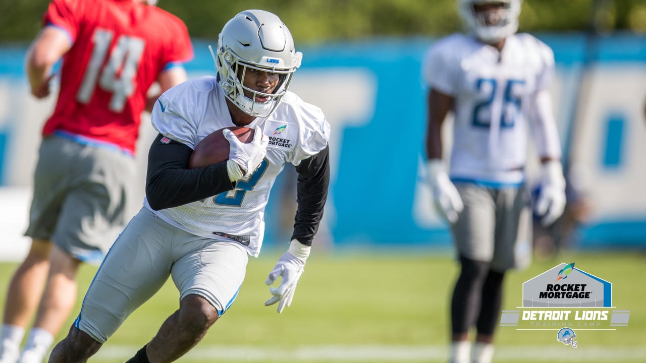 Former Lions running back Kerryon Johnson works out for NFC North rival