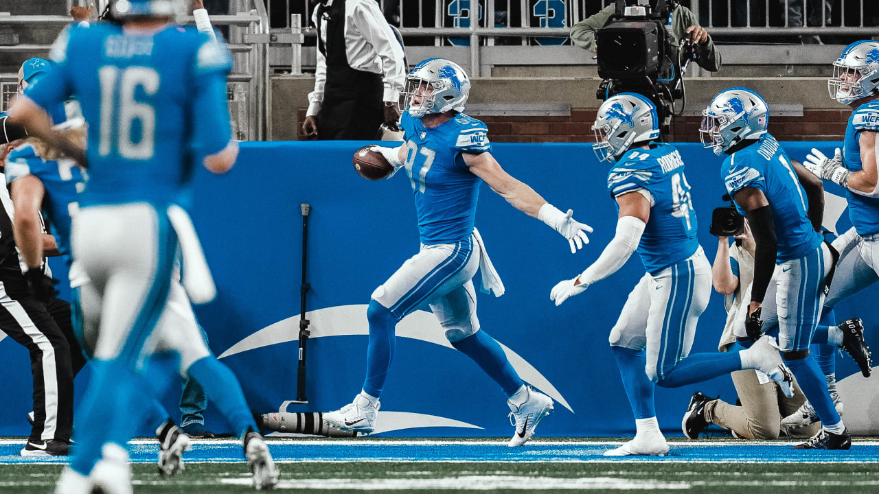 WATCH: Lions rookie Aidan Hutchinson picks off Aaron Rodgers in