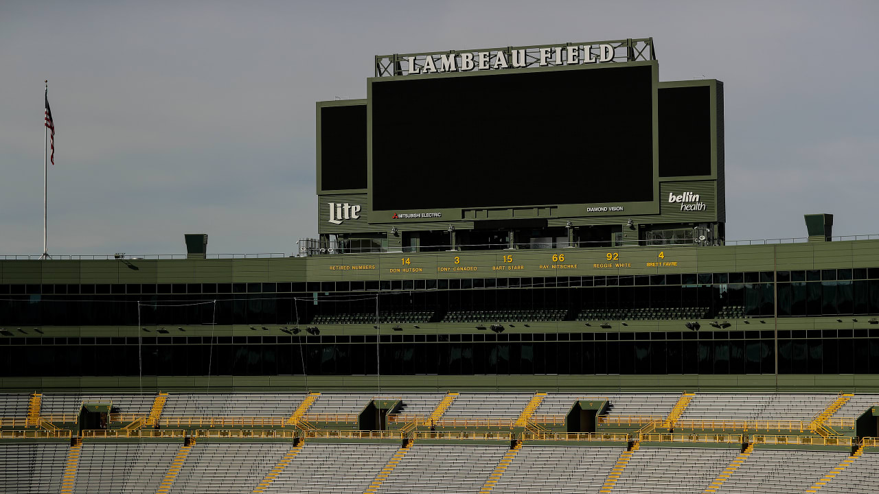 View of Lambeau Field scoreboard with image of Lombardi trophies