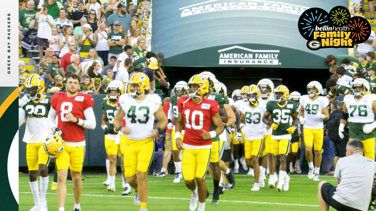 Packers walk onto Lambeau Field with their families Packers Family Night