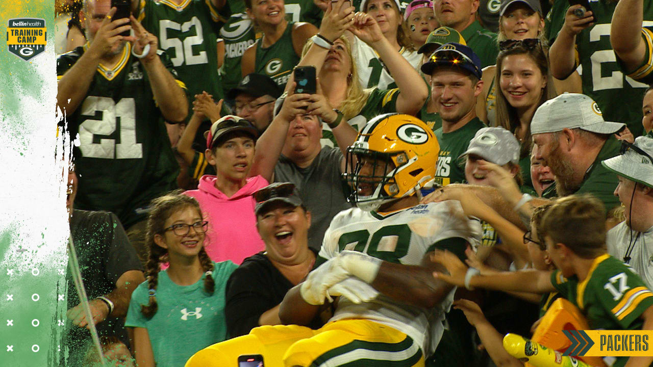 ASHWAUBENON, WI - AUGUST 05: Green Bay Packers running back AJ Dillon (28)  makes a catch during Green Bay Packers Family Night at Lambeau Field, on  August 5, 2022 in Green Bay