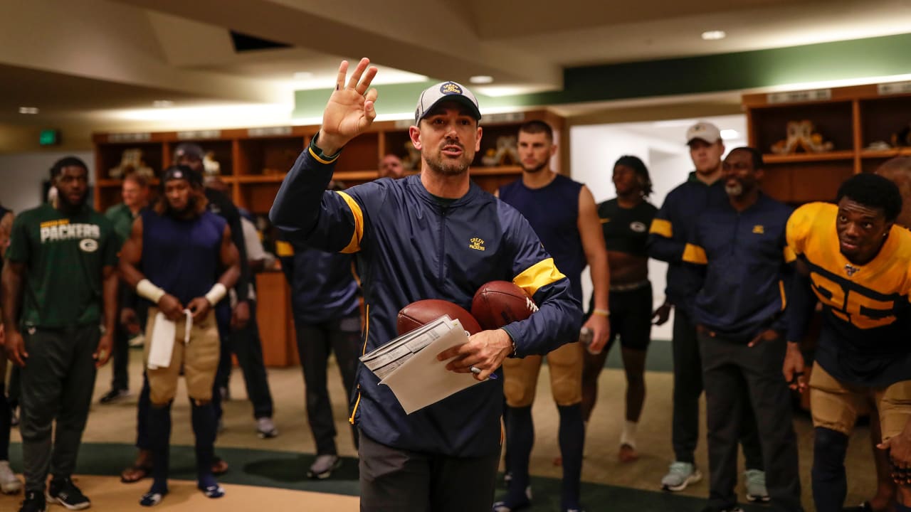 Packers Celebrate Win Over Broncos In Lambeau Field Locker Room