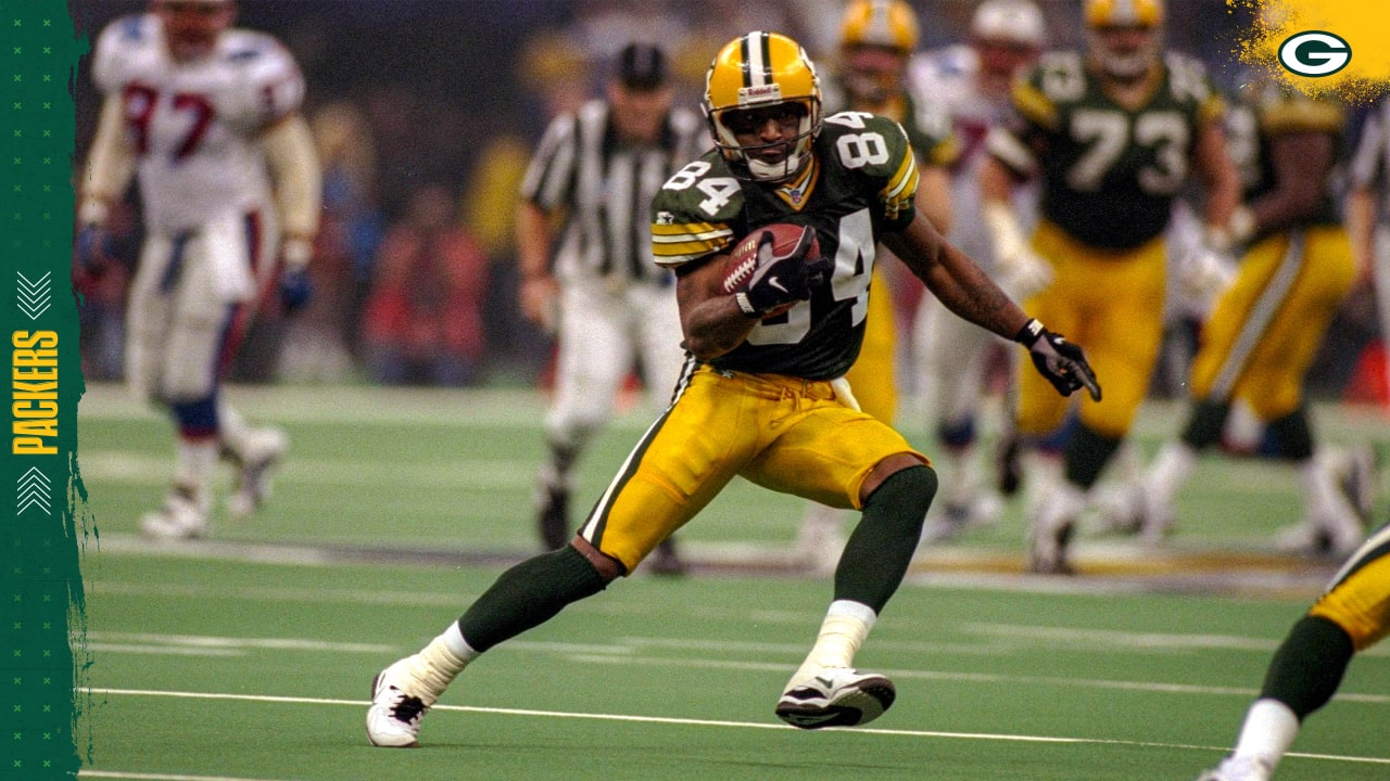 Wide receiver Andre Rison of the Cleveland Browns carries the