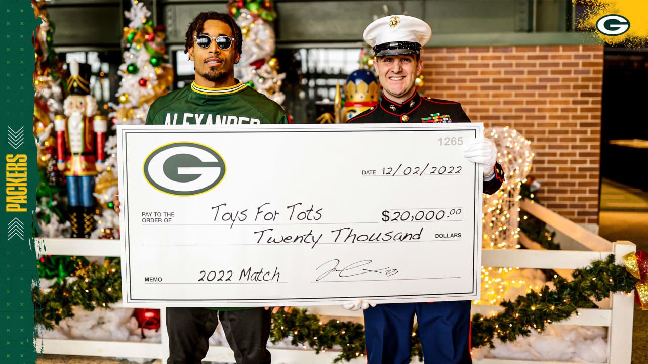 Photos: Packers, Jaire Alexander award donations to Toys for Tots at  Lambeau Field