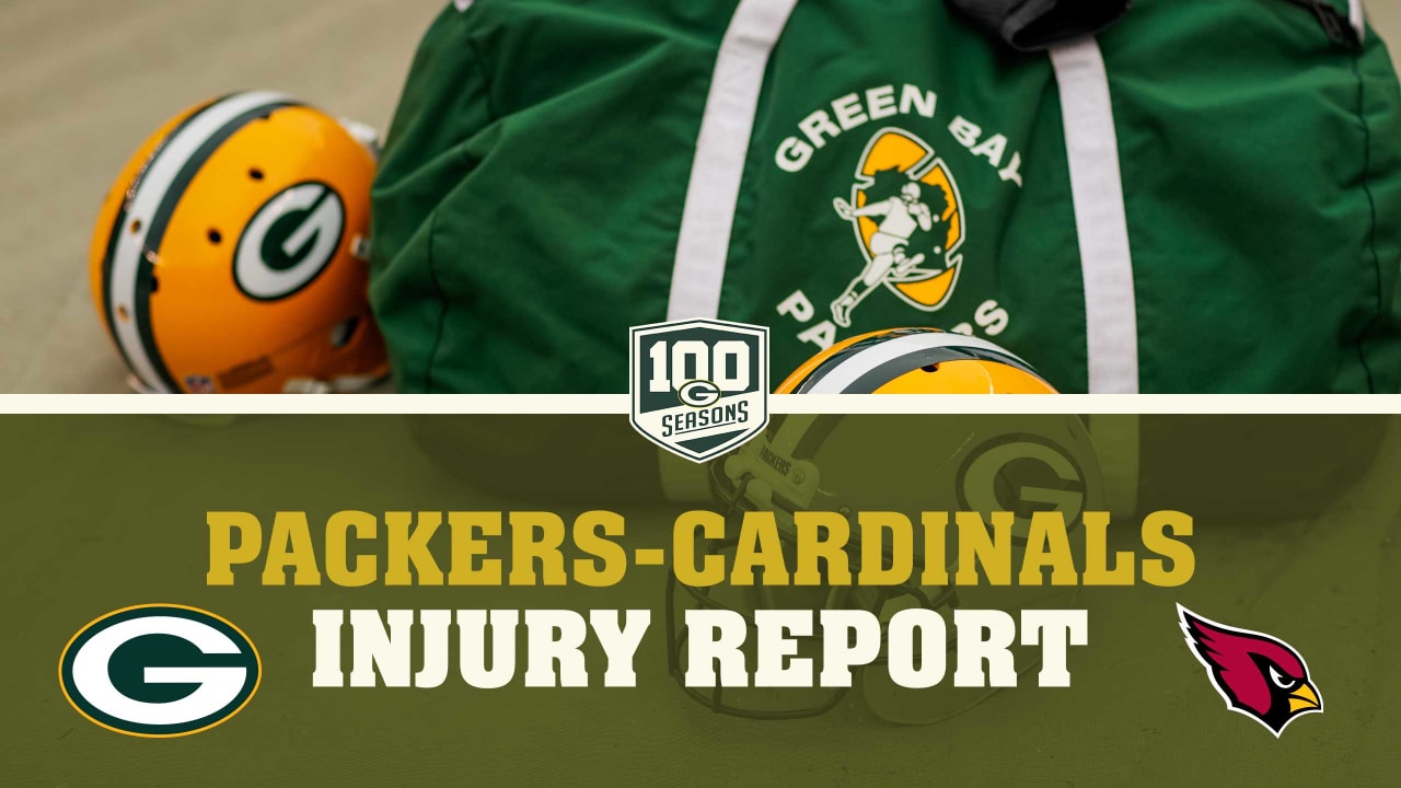Packers' offensive line blocking during the game against the Cardinals