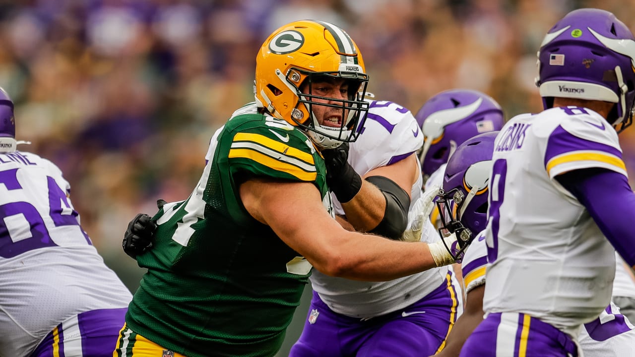 Green Bay Packers defensive end Dean Lowry (94) is blocked by Detroit Lions  offensive tackle Penei Sewell (58) during the first half of an NFL football  game Sunday, Nov. 6, 2022, in