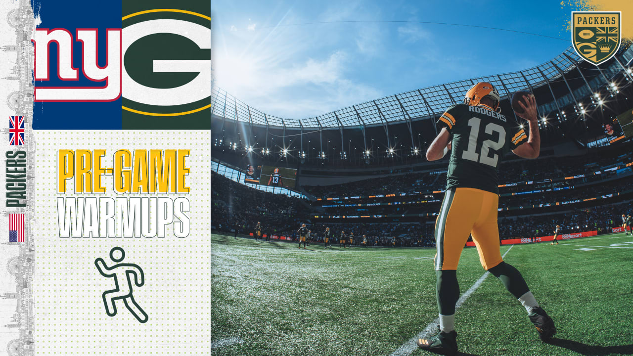 Green Bay Packers players form a huddle as they warm-up before an NFL game  between the New York Giants and the Green Bay Packers at the Tottenham  Hotspur stadium in London, Sunday