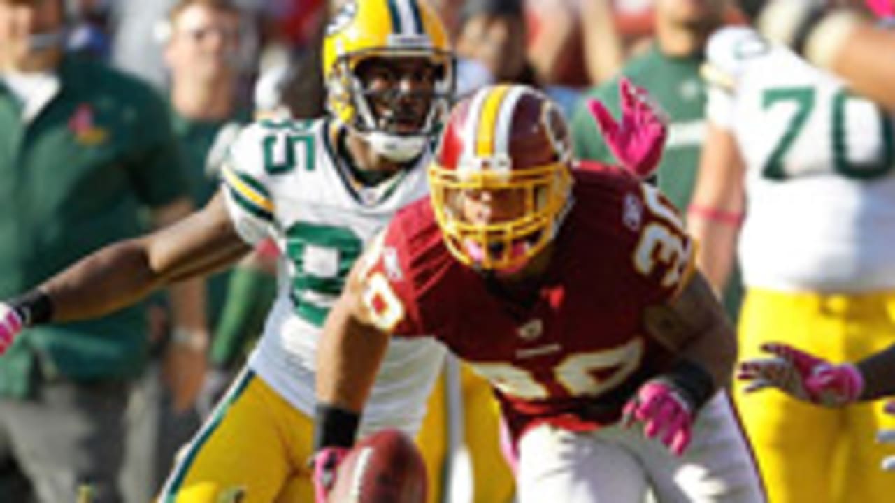 Washington Redskins quarterback Donovan McNabb (5) is sacked by Green Bay  Packers linebacker Clay Matthews (52) during the 3rd quarter at FedEx Field  in Landover, MD, Sunday, October 10, 2010. (Photo by