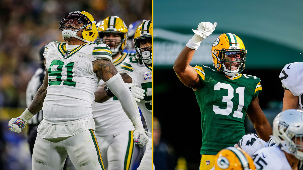 Green Bay Packers' Jaire Alexander signs autographs at the NFL