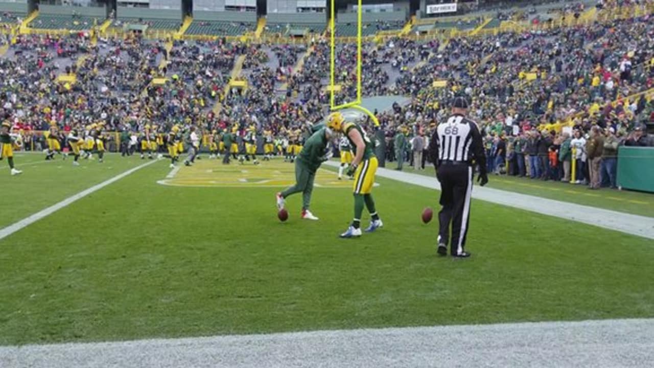 Photos: Packers, Jaire Alexander award donations to Toys for Tots at  Lambeau Field