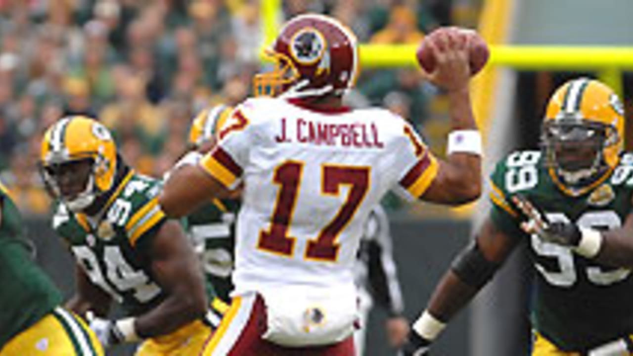 Washington Redskins tightend Chris Cooley is tackled by Titans