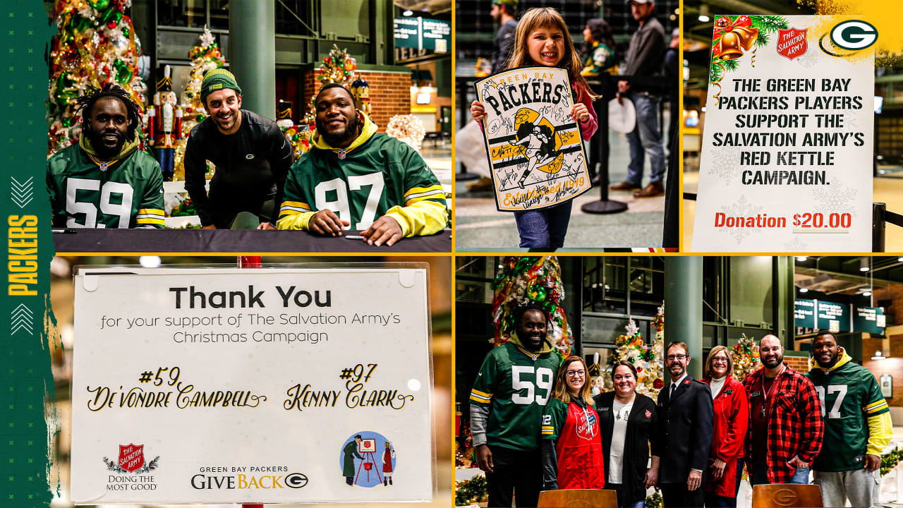 Photos: Kenny Clark, De'Vondre Campbell sign autographs for Salvation Army's  Red Kettle event