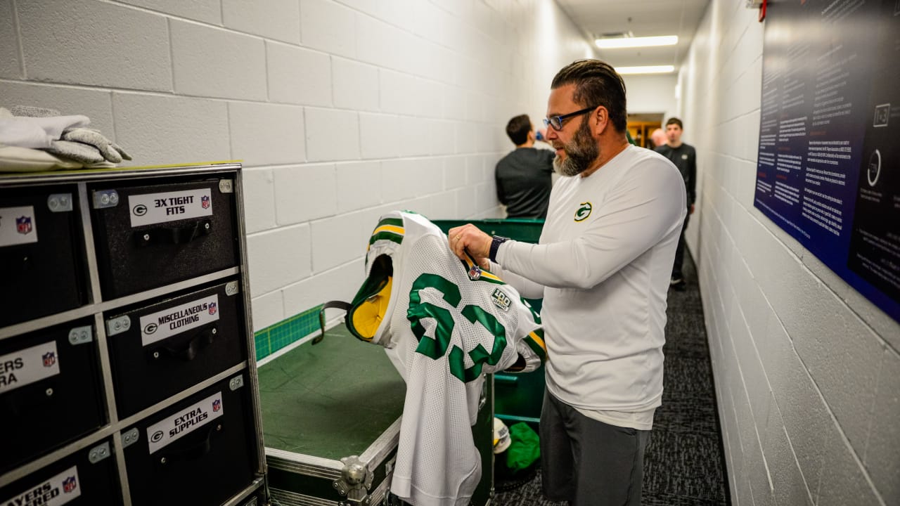Equipment staff preps Packers locker room at Soldier Field