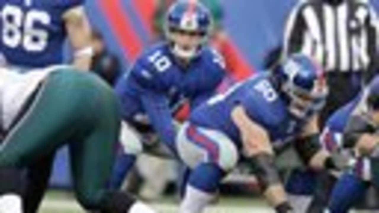 Buffalo Bills linebacker Bryan Scott (43) spikes the ball after returning  an interception for a touchdown as teammate Aaron Williams (23) look on  during the first half of an NFL football game