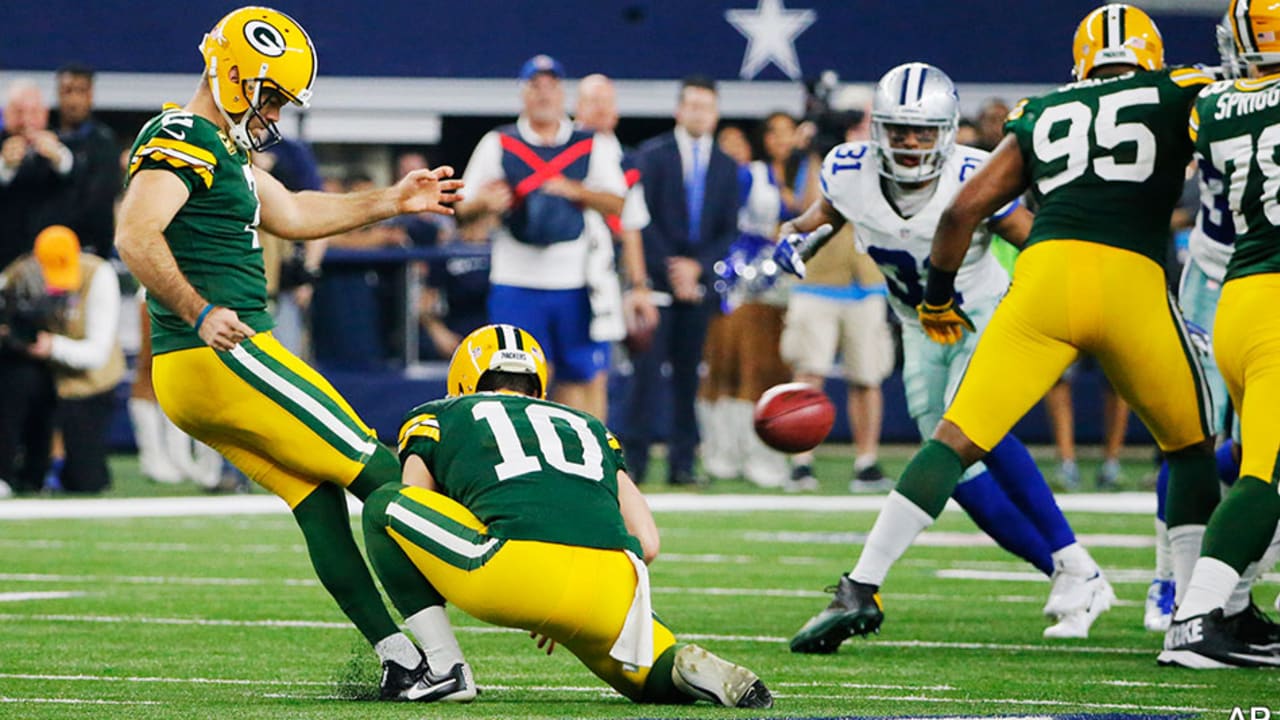 Georgetown's Mason Crosby kicks past the Cowboys