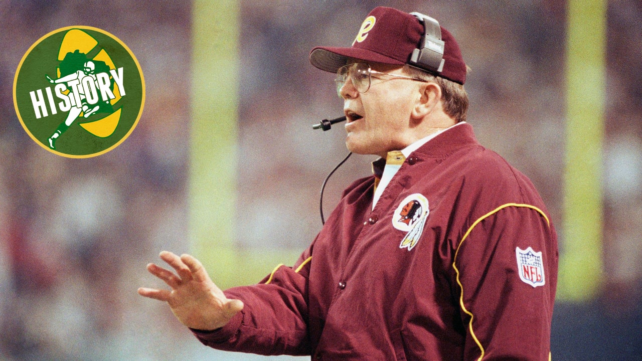 Head coach Joe Gibbs of the Washington Redskins looks on from the