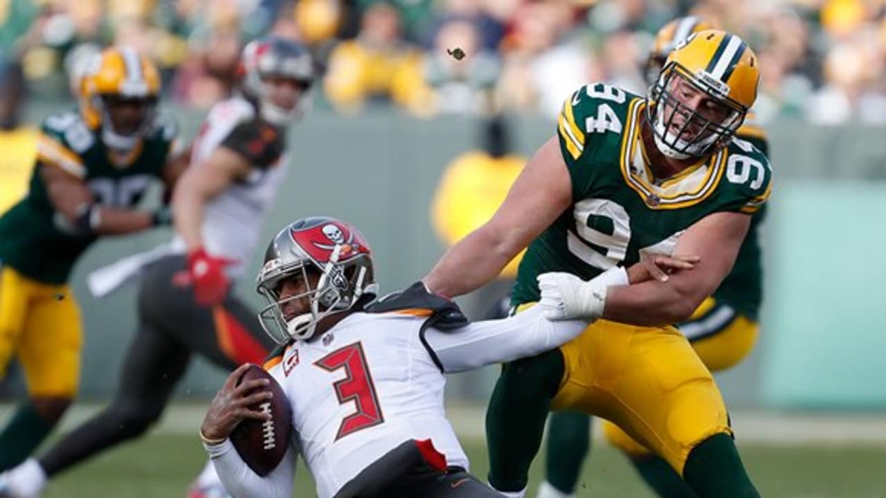 Photos: Packers, Jaire Alexander award donations to Toys for Tots at  Lambeau Field