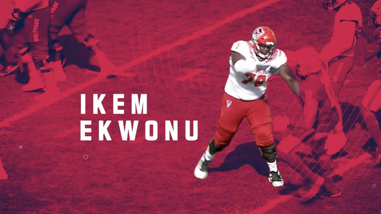 Download Ikem Ekwonu Red And White Football Kit Wallpaper