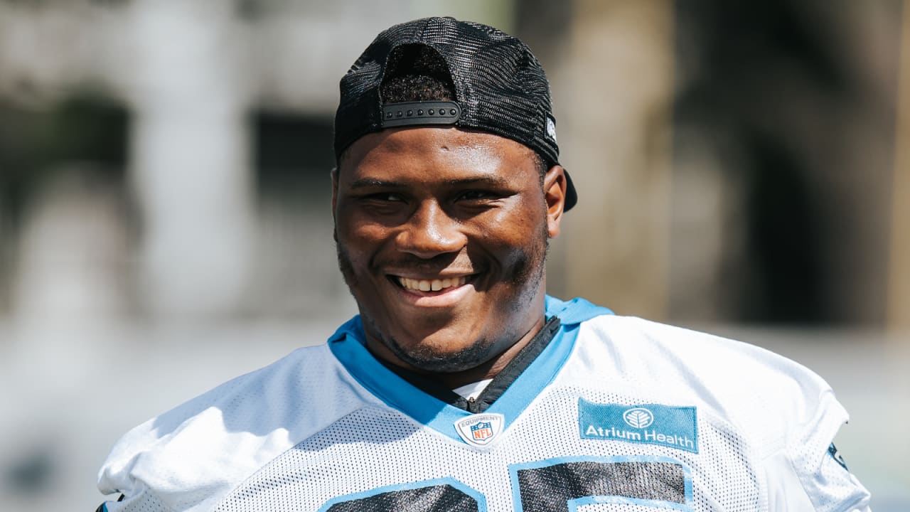 Defensive end Mike Fox of the Carolina Panthers sits on the bench